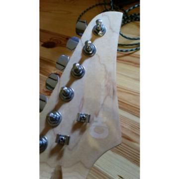Possibly a Charvel Electric Guitar
