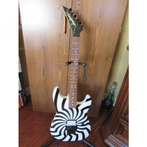 Charvel/Jackson Black on White Buzzsaw guitar with hard shell case #1 image
